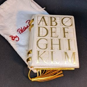Paloma Picasso alphabet mini purse. Cream and gold.